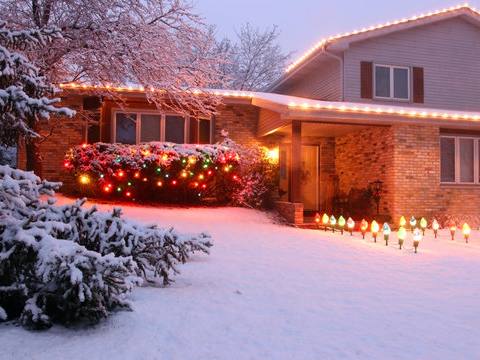 Wrapped trees and a warm white facade